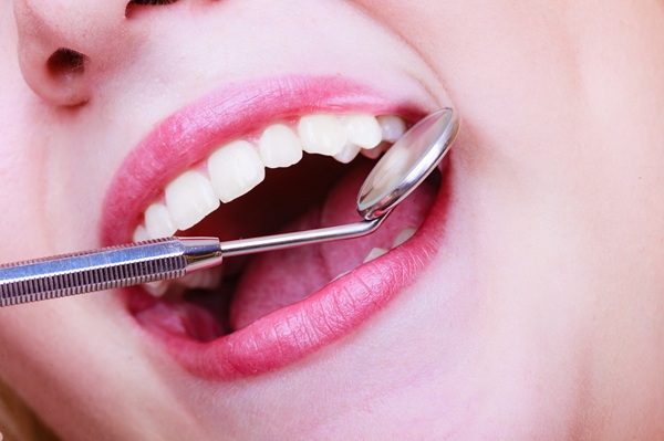 The Complete Guide To Oral Cancer Screenings, And Why They Matter